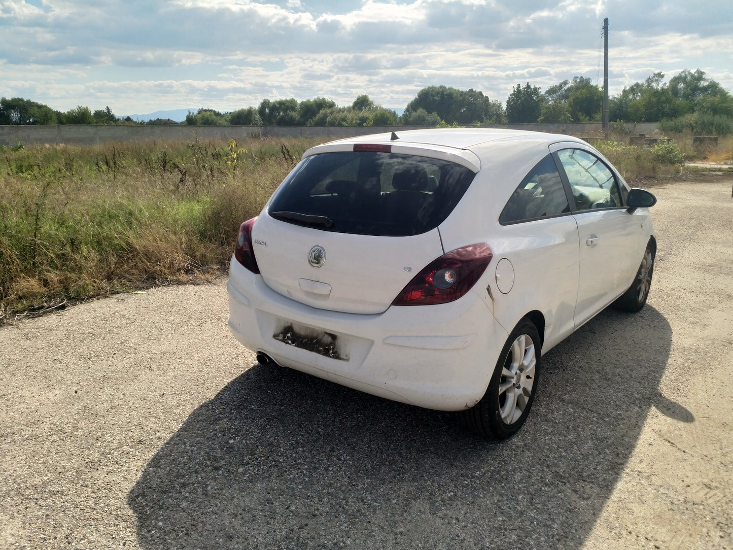 Opel Corsa D 1,2 white Z12XEP 3-door 2009 / S0719 снимки