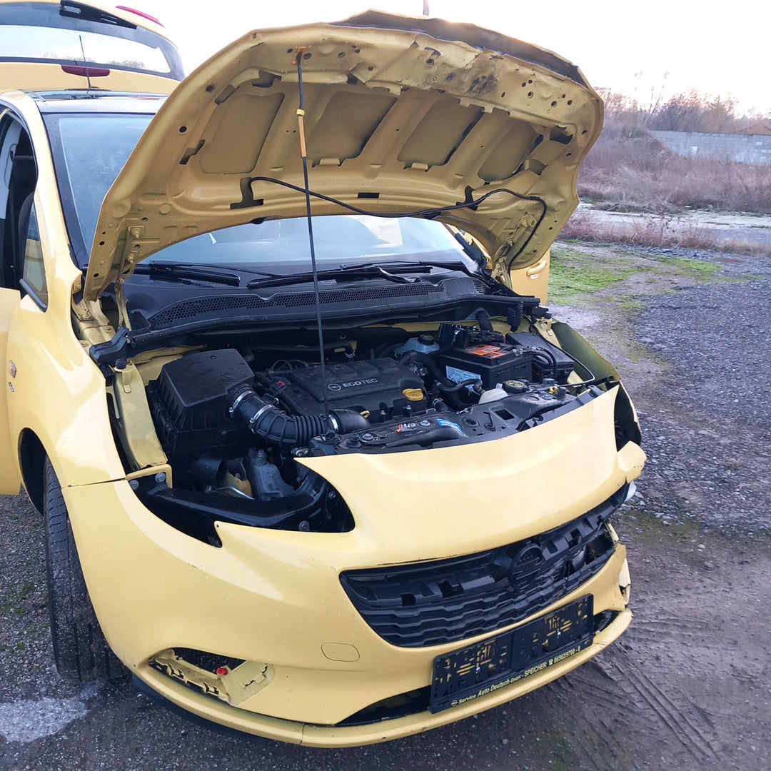 Opel Corsa E yellow 1,4 turbo 101 кс B14NEJ 2015 г./ X1501 снимки